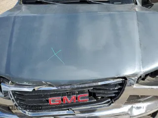 2009 GMC Canyon Work Truck with VIN 1GTDT19E698142512, listed as a Copart auction lot 77493574 with 0 mi miles and Salvage Title. Bid and sale history available at carsss.com. Image 11.