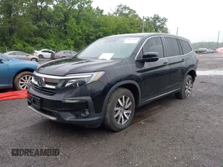 2022 Honda Pilot EX-L with VIN 5FNYF6H58NB018372, listed as a IAAI auction lot 42327580 with 79,332 mi miles and . Bid and sale history available at DreamBid. Image 2.