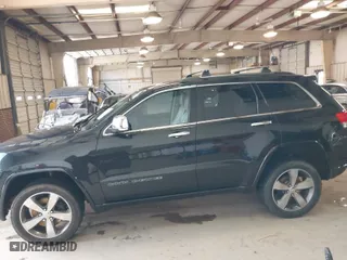 2014 Jeep Grand Cherokee Overland with VIN 1C4RJFCM4EC386398, listed as a IAAI auction lot 41696113 with 119,110 mi miles. Bid and sale history available at carsss.com. Image 14.