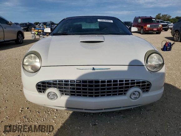 2002 Ford Thunderbird Hardtop Premium z VIN 1FAHP60A92Y103048, wystawiony jako Copart lot #73916924 z przebiegiem 75 396 mil mil oraz Szkoda całkowita • Salvage title. Historia ofert i sprzedaży dostępna na DreamBid. Obrazek 5.