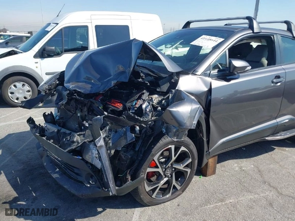 2019 Toyota C-HR XLE with VIN JTNKHMBX4K1026497, listed as a IAAI auction lot 41848644 with 53,211 mi miles. Bid and sale history available at carsss.com. Image 6.