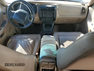 1999 Ford Explorer XLT z VIN 1FMZU32E8XUA72715, wystawiony jako Copart lot #41881985 z przebiegiem 242 982 mil mil oraz Szkoda całkowita • Salvage title. Historia ofert i sprzedaży dostępna na DreamBid. Obrazek 8.