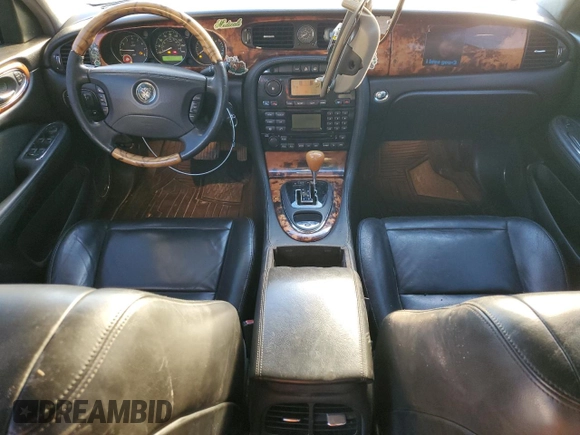 2004 Jaguar XJ with VIN SAJWA71C84SG32106, listed as a Copart auction lot 81837704 with 119,268 mi miles and Salvage Title. Bid and sale history available at carsss.com. Image 8.