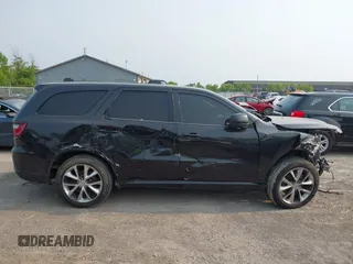 2014 Dodge Durango R/T with VIN 1C4SDHCT4EC513789, listed as a IAAI auction lot 42389059 with 151,506 mi miles and . Bid and sale history available at DreamBid. Image 12.