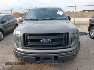 2014 Ford F-150 XL with VIN 1FTFW1EFXEKF21377, listed as a IAAI auction lot 42133053 with 99,924 mi miles and . Bid and sale history available at DreamBid. Image 12.