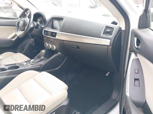 2016 Mazda CX-5 Touring with VIN JM3KE2CY5G0791537, listed as a IAAI auction lot 41396276 with 42,095 mi miles. Bid and sale history available at carsss.com. Image 5.