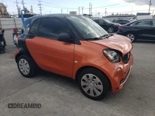 2016 Smart fortwo Passion z VIN WMEFJ5DAXGK069026, wystawiony jako Copart lot #53535045 z przebiegiem 34 410 mil mil oraz Tytuł czysty. Historia ofert i sprzedaży dostępna na DreamBid. Obrazek 4.