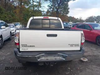 2014 Toyota Tacoma PreRunner with VIN 3TMJU4GN3EM162405, listed as a IAAI auction lot 40807077 with 103,298 mi miles. Bid and sale history available at carsss.com. Image 16.