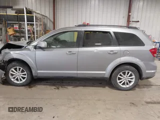 2016 Dodge Journey SXT with VIN 3C4PDCBG0GT198686, listed as a IAAI auction lot 41561007 with 85,289 mi miles. Bid and sale history available at carsss.com. Image 13.
