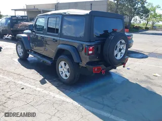 2018 Jeep Wrangler Unlimited Sport S with VIN 1C4HJXDG4JW149557, listed as a IAAI auction lot 42014833 with 54,472 mi miles. Bid and sale history available at carsss.com. Image 3.