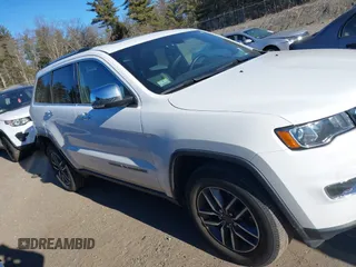 2021 Jeep Grand Cherokee 80th Anniversary z VIN 1C4RJFBG0MC730058, wystawiony jako IAAI lot #41263939 z przebiegiem 34 659 mil mil oraz . Historia ofert i sprzedaży dostępna na DreamBid. Obrazek 13.