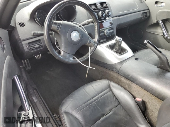 2007 Saturn Sky z VIN 1G8MB33B97Y100033, wystawiony jako Copart lot #76378344 z przebiegiem Nie podano mil oraz Szkody całkowita. Historia ofert i sprzedaży dostępna na DreamBid. Obrazek 8.