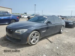 2014 BMW 7 Series 750i с VIN WBAYA8C51ED499832, выставлен на аукционе Copart как лот 50968075 с пробегом 103 420 миль миль и Чистый • Clean title. История ставок и продаж доступна на DreamBid. Изображение 1.