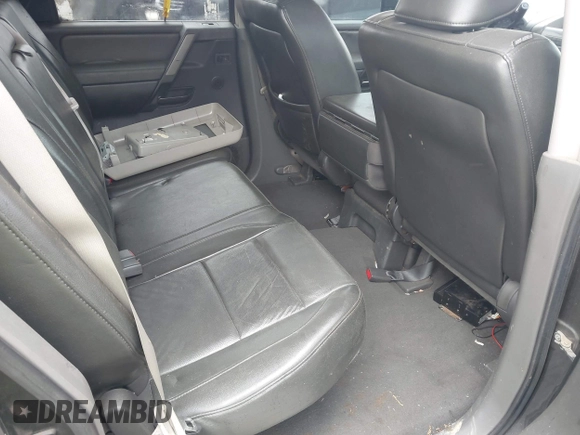 2005 Nissan Titan LE z VIN 1N6AA07B05N557667, wystawiony jako IAAI lot #42292562 z przebiegiem 197 874 mil mil oraz . Historia ofert i sprzedaży dostępna na DreamBid. Obrazek 8.