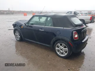 2013 MINI Convertible with VIN WMWZN3C53DT135492, listed as a IAAI auction lot 41436703 with 79,408 mi miles and . Bid and sale history available at DreamBid. Image 3.