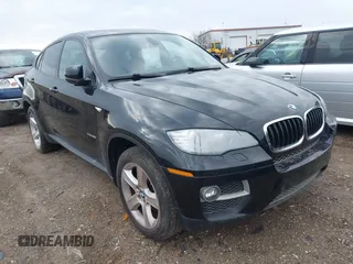 2014 BMW X6 xDrive35i with VIN 5UXFG2C56E0C45631, listed as a IAAI auction lot 41967186 with 86,773 mi miles. Bid and sale history available at carsss.com. Image 1.