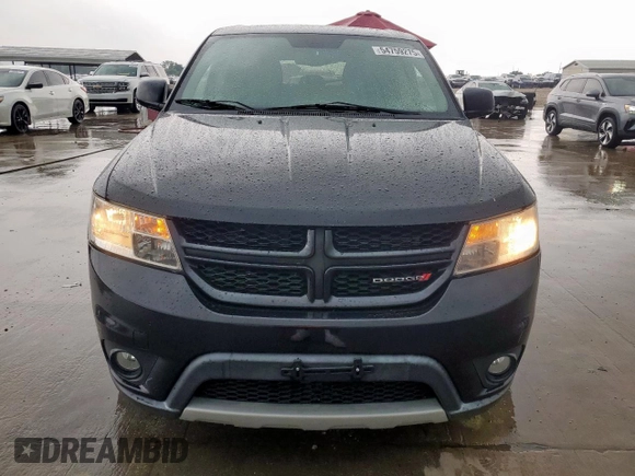 2013 Dodge Journey R/T with VIN 3C4PDCEG2DT500101, listed as a Copart auction lot 54759275 with 140,814 mi miles and Salvage title. Bid and sale history available at DreamBid. Image 5.