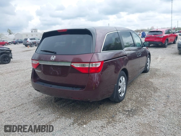 2013 Honda Odyssey LX with VIN 5FNRL5H25DB080209, listed as a IAAI auction lot 42123644 with 157,631 mi miles and . Bid and sale history available at carsss.com. Image 4.