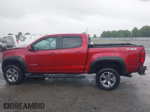 2017 Chevrolet Colorado 4WD Z71 with VIN 1GCGTDEN1H1315297, listed as a IAAI auction lot 42345596 with 143,813 mi miles and . Bid and sale history available at DreamBid. Image 14.