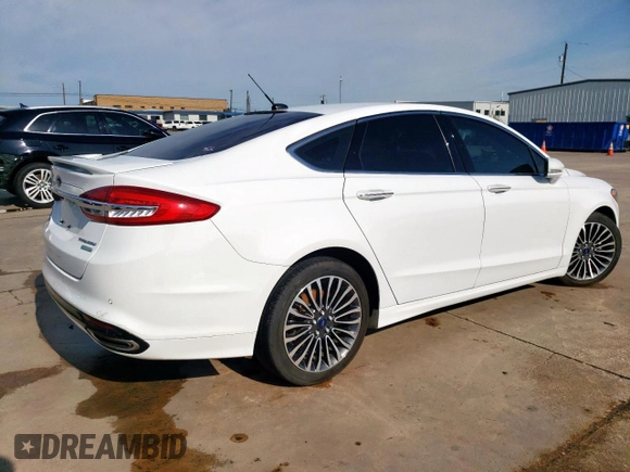 2017 Ford Fusion Titanium с VIN 3FA6P0K99HR118082, выставлен на аукционе Copart как лот 55459615 с пробегом 89 148 миль миль и Чистый • Clean title. История ставок и продаж доступна на DreamBid. Изображение 3.