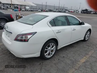 2014 Nissan Maxima S with VIN 1N4AA5AP7EC499224, listed as a IAAI auction lot 42014369 with 74,399 mi miles and . Bid and sale history available at DreamBid. Image 4.