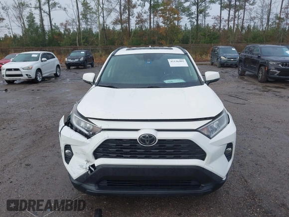2019 Toyota RAV4 XLE with VIN JTMW1RFV8KD006767, listed as a IAAI auction lot 41126402 with 69,913 mi miles. Bid and sale history available at carsss.com. Image 12.
