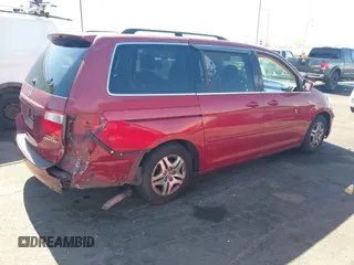 2005 Honda Odyssey EX z VIN 5FNRL38445B401163, wystawiony jako IAAI lot #42294253 z przebiegiem 152 576 mil mil oraz . Historia ofert i sprzedaży dostępna na DreamBid. Obrazek 14.