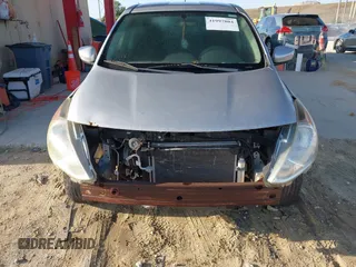 2016 Nissan Versa S z VIN 3N1CN7AP7GL834883, wystawiony jako IAAI lot #41997804 z przebiegiem 110 754 mil mil oraz . Historia ofert i sprzedaży dostępna na DreamBid. Obrazek 6.