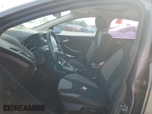 2012 Ford Focus SE z VIN 1FAHP3K28CL298448, wystawiony jako Copart lot #57852505 z przebiegiem 163 707 mil mil oraz Szkody całkowita. Historia ofert i sprzedaży dostępna na DreamBid. Obrazek 7.