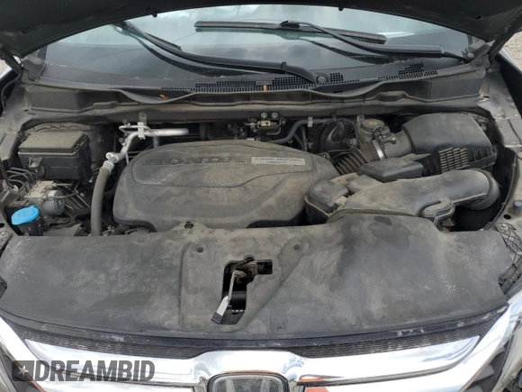 2019 Honda Odyssey EX-L z VIN 5FNRL6H79KB133976, wystawiony jako Copart lot #56988215 z przebiegiem Nie podano mil oraz Szkoda całkowita • Salvage title. Historia ofert i sprzedaży dostępna na DreamBid. Obrazek 12.