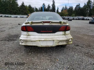 2002 Pontiac Sunfire SE z VIN 1G2JB524327294701, wystawiony jako Copart lot #73310254 z przebiegiem Nie podano mil oraz Czysty tytuł • Clean title. Historia ofert i sprzedaży dostępna na DreamBid. Obrazek 6.
