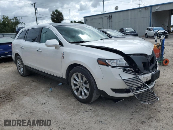 2014 Lincoln MKT with VIN 2LMHJ5FK5EBL57377, listed as a Copart auction lot 70608694 with 115,053 mi miles and Salvage Title. Bid and sale history available at DreamBid. Image 4.
