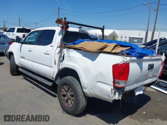 2016 Toyota Tacoma SR5 with VIN 5TFAX5GN8GX053836, listed as a IAAI auction lot 41973740 with 191,653 mi miles. Bid and sale history available at carsss.com. Image 3.
