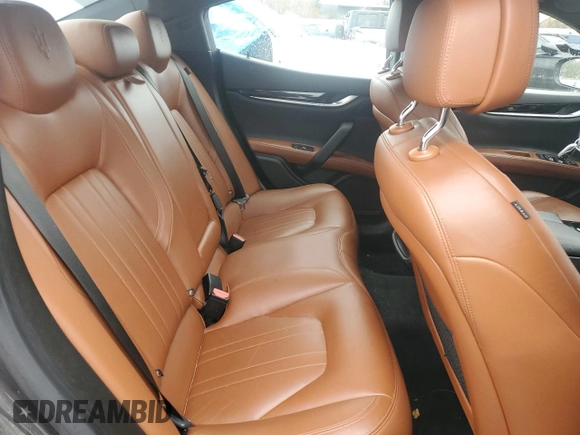 2017 Maserati Ghibli S Q4 z VIN ZAM57RTA4H1248389, wystawiony jako Copart lot #85218514 z przebiegiem 68 272 mil mil oraz Szkody całkowita. Historia ofert i sprzedaży dostępna na DreamBid. Obrazek 10.