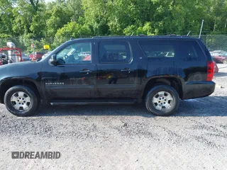 2011 Chevrolet Suburban LT z VIN 1GNSKJE34BR400810, wystawiony jako IAAI lot #42379234 z przebiegiem 273 228 mil mil oraz . Historia ofert i sprzedaży dostępna na DreamBid. Obrazek 14.