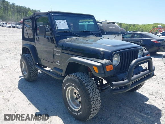 2002 Jeep Wrangler Sport with VIN 1J4FA49S52P700846, listed as a IAAI auction lot 42052276 with 231,851 mi miles. Bid and sale history available at carsss.com. Image 1.