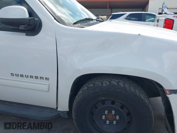 2013 Chevrolet Suburban LT with VIN 1GNSCJE08DR102735, listed as a IAAI auction lot 42228063 with 101,671 mi miles and . Bid and sale history available at DreamBid. Image 12.