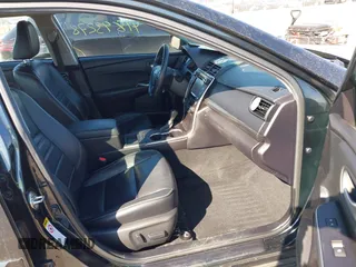 2015 Toyota Camry LE z VIN 4T1BD1FK8FU148065, wystawiony jako IAAI lot #41843278 z przebiegiem 91 137 mil mil oraz . Historia ofert i sprzedaży dostępna na DreamBid. Obrazek 5.