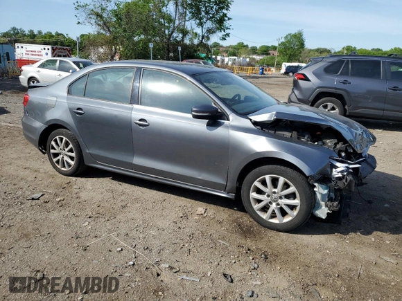 2013 Volkswagen Jetta SE with VIN 3VWDX7AJ1DM357085, listed as a Copart auction lot 55045725 with 156,513 mi miles and Salvage title. Bid and sale history available at DreamBid. Image 4.