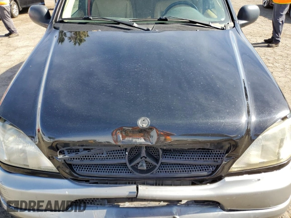 1999 Mercedes-Benz M-Class with VIN 4JGAB54E6XA141592, listed as a Copart auction lot 79514124 with 0 mi miles and Salvage Title. Bid and sale history available at carsss.com. Image 13.