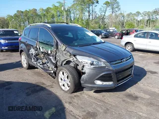 2016 Ford Escape Titanium with VIN 1FMCU9J94GUA63359, listed as a IAAI auction lot 41954514 with 94,315 mi miles. Bid and sale history available at carsss.com. Image 1.