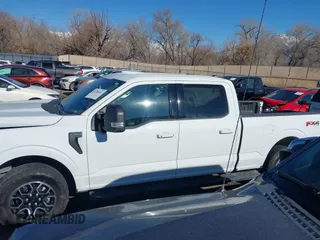 2023 Ford F-150 XL with VIN 1FTFW1E87PFB31057, listed as a IAAI auction lot 41388451 with 28,233 mi miles. Bid and sale history available at carsss.com. Image 14.