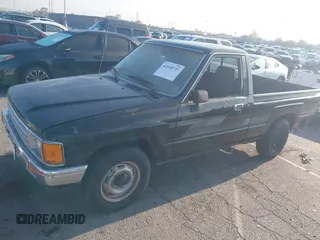 1987 Toyota Pickup with VIN JT4RN50R8H0277401, listed as a IAAI auction lot 42148719 with 239,923 mi miles and . Bid and sale history available at DreamBid. Image 2.