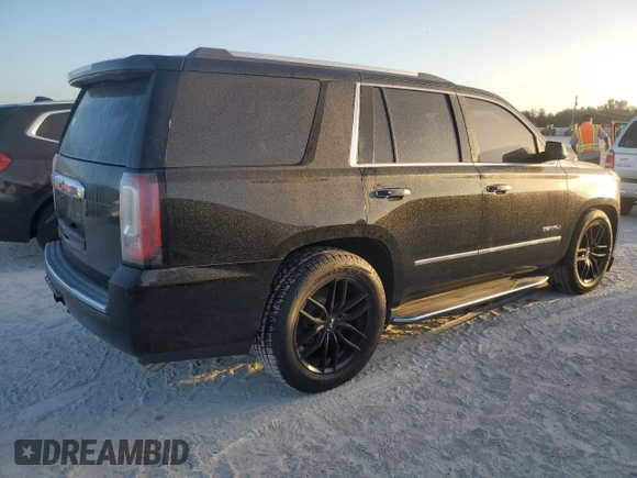 2015 GMC Yukon Denali with VIN 1GKS2CKJ5FR529091, listed as a Copart auction lot 77325934 with 0 mi miles and Clean Title. Bid and sale history available at carsss.com. Image 3.