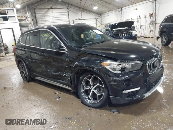 2018 BMW X1 xDrive28i with VIN WBXHT3C30J5K29383, listed as a IAAI auction lot 41503314 with 107,678 mi miles. Bid and sale history available at carsss.com. Image 1.