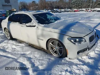 2014 BMW 7 Series 740Li xDrive with VIN WBAYF4C57ED282182, listed as a IAAI auction lot 41324877 with 102,699 mi miles. Bid and sale history available at carsss.com. Image 1.