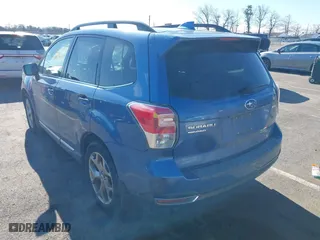 2018 Subaru Forester Touring with VIN JF2SJAWCXJH467976, listed as a IAAI auction lot 41744472 with 98,919 mi miles. Bid and sale history available at carsss.com. Image 3.