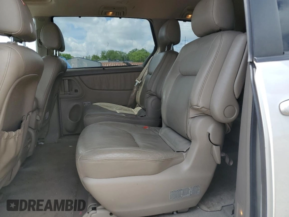 2004 Toyota Sienna XLE z VIN 5TDZA22C04S170319, wystawiony jako Copart lot #56543265 z przebiegiem 184 061 mil mil oraz Szkoda całkowita • Salvage title. Historia ofert i sprzedaży dostępna na DreamBid. Obrazek 11.