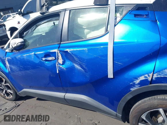 2019 Toyota C-HR XLE with VIN JTNKHMBX5K1043079, listed as a IAAI auction lot 41813367 with 77,879 mi miles and . Bid and sale history available at DreamBid. Image 15.