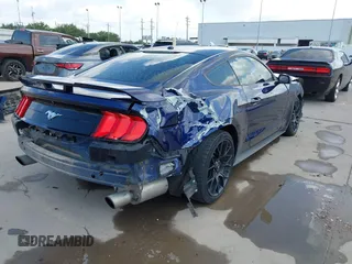 2018 Ford Mustang EcoBoost z VIN 1FA6P8TH0J5104312, wystawiony jako IAAI lot #42532806 z przebiegiem 87 564 mil mil oraz . Historia ofert i sprzedaży dostępna na DreamBid. Obrazek 4.